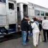 People boarding a train