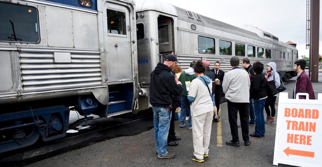 People boarding a train