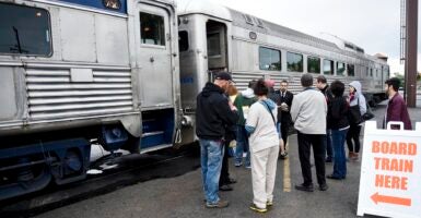 People boarding a train