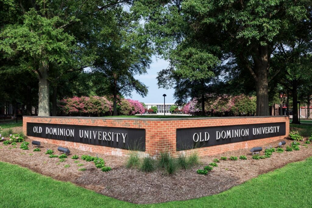 A low brick wall with two sides reading "Old Dominion University."