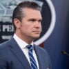 Secretary of War Pete Hegseth speaks to reporters a Pentagon press briefing.
