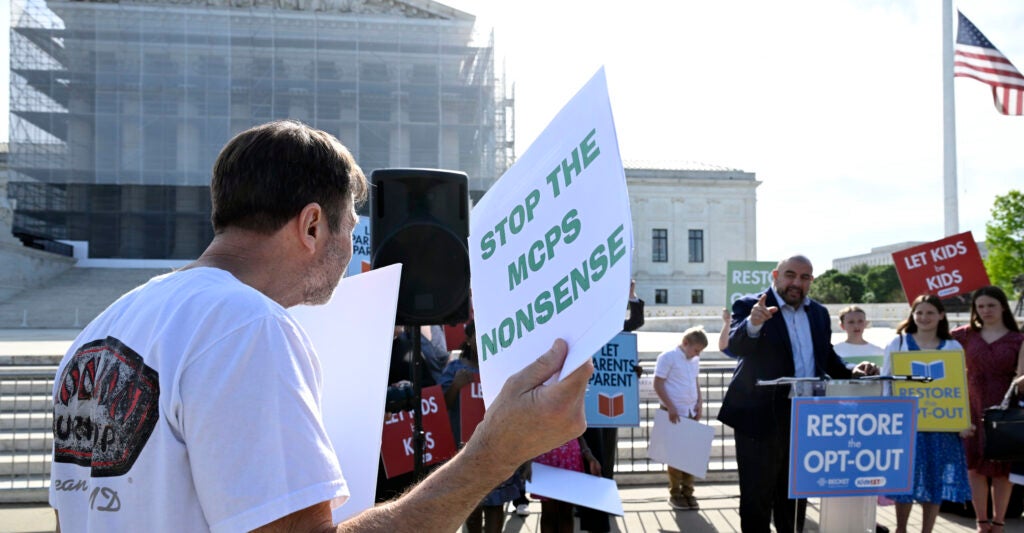 WASHINGTON, DC - APRIL 22: Wael Elkoshairi, right, a parent in the Montgomery County MD speaks to restore the Opt-Out policy in public schools at a rally as oral arguments on Mahmoud v. Taylor, a religious freedom case involving LBGTQ+ curriculum. A diverse coalition of plaintiffs seek to defend their rights as religious parents to be notified and opt their children out of Montgomery County Maryland's controversial LGBTQ curriculum at the Supreme Court in Washington, DC on April 22, 2025. (Photo by John McDonnell/For The Washington Post via Getty Images)
