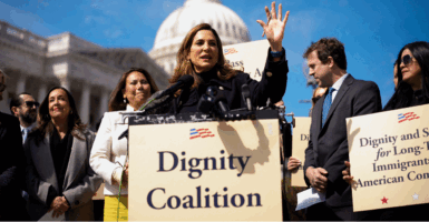 WASHINGTON, DC - MARCH 25: Rep. Maria Elvira Salazar (R-FL) (C), accompanied by Rep. Veronica Escobar (D-TX) (C-L), speaks at a Dignity Coalition news conference on Capitol Hill on March 25, 2026 in Washington, DC. The Dignity Coalition is a bipartisan group that has formed to support the 