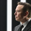Elon Musk in a suit