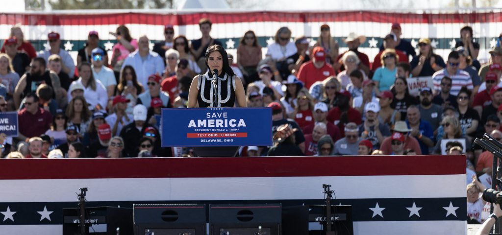 Madison Gesiotto Gilbert speaks in front of a crowd of supporters