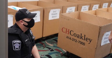 Biden questions elections